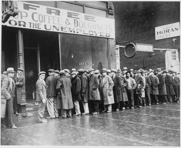 Unemployed people line up for soup at Al Capone's soup kitchen in Chicago. 1931